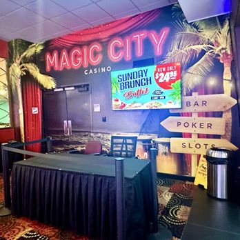 The Magic City Casino gaming floor, buffet, poker, and slot signs