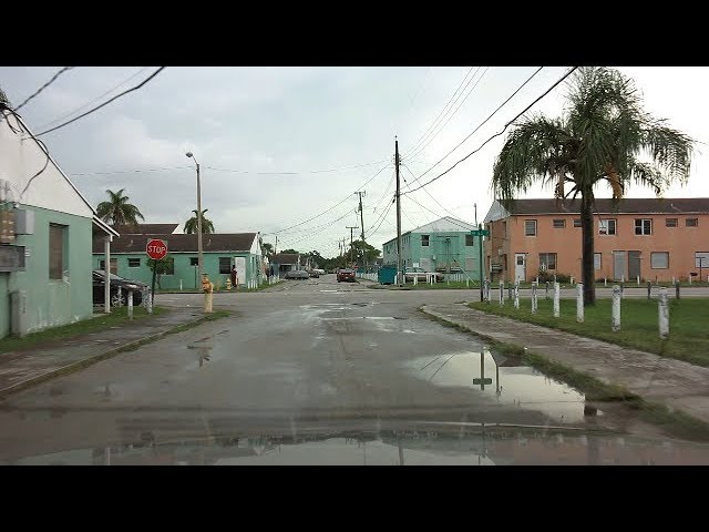A wet Miami neighborhood street