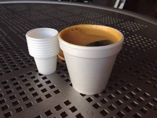 Tiny cups of Cuban coffee left beside the casino games